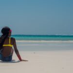 White sand beach and palm trees at Diani Beach, Kenya